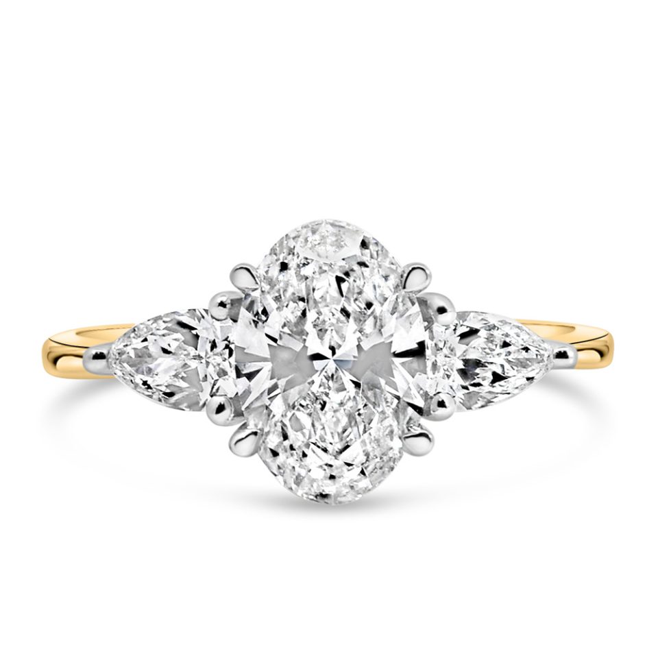 Trinity Engagement Ring adorned with 2.00 Carat Total Weight of Lab Created Diamonds, set in elegant 14kt Yellow Gold