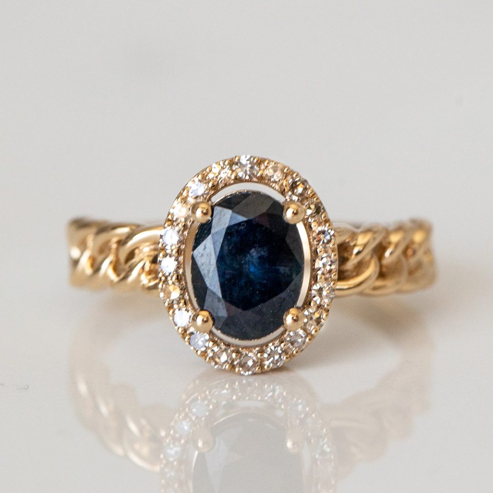 Ring with 8X6MM Oval Blue Sapphire and .16 Carat TW of Diamonds in 10kt Yellow Gold