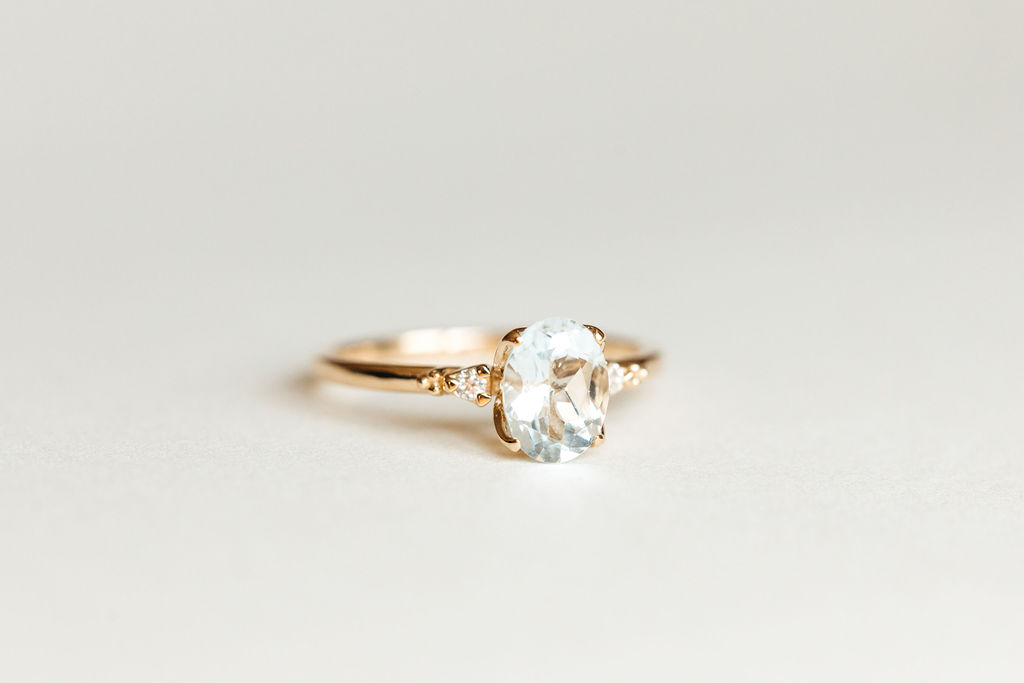 Ring with 8X6MM Oval Aquamarine and .04 Carat TW of Diamonds in 14kt Yellow Gold