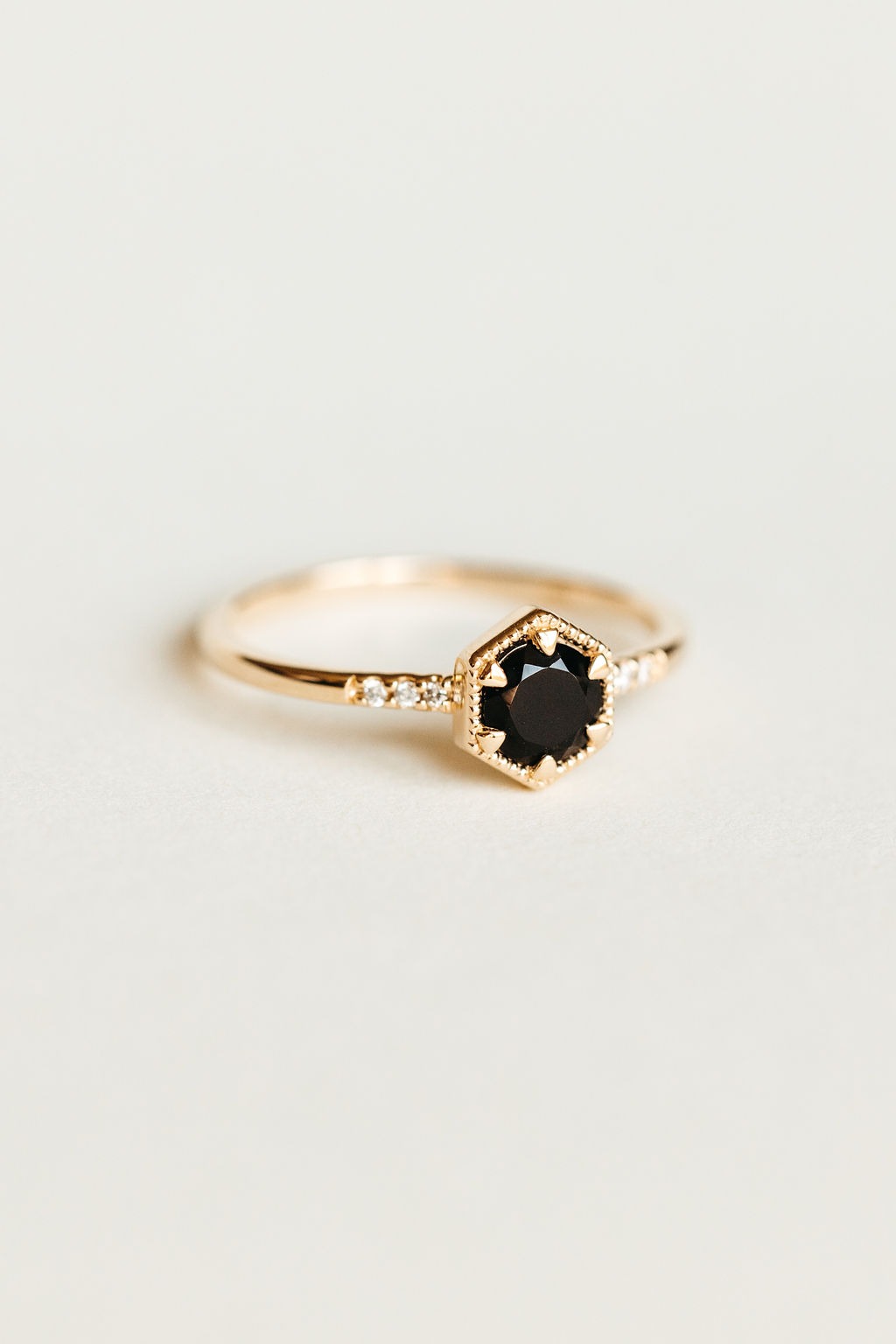 Ring with 5MM Black Onyx and .03 Carat TW of Diamonds in 10kt Yellow Gold