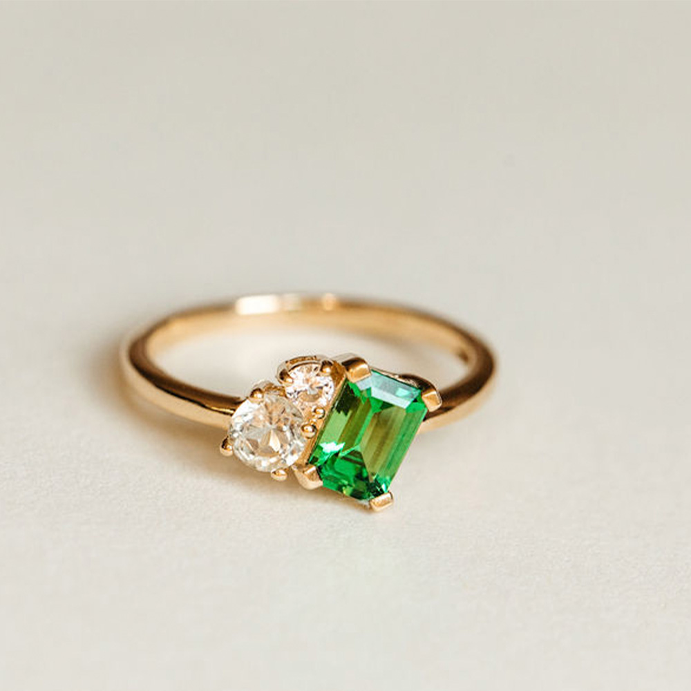 Ring with 7X5MM Emerald Cut Green Garnet, Amethyst and White Topaz 10kt Yellow Gold