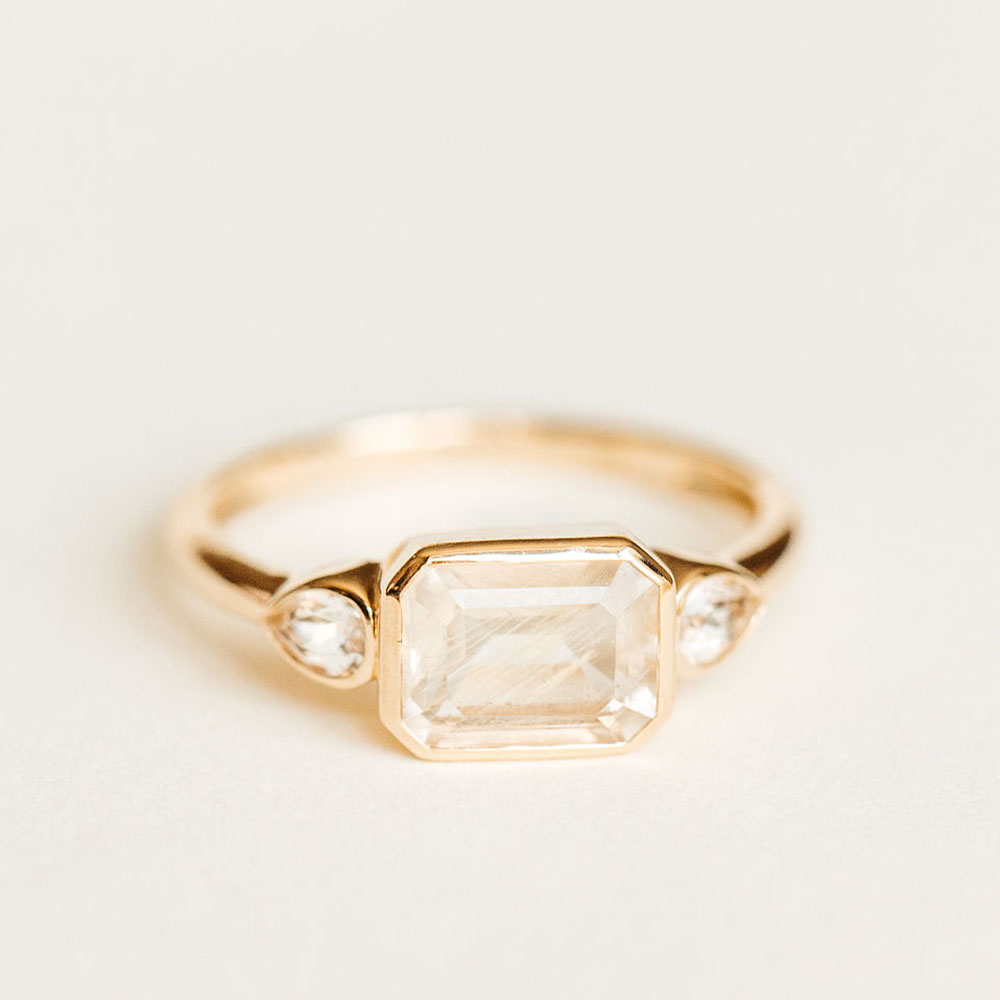 Ring with 8X5MM Emerald Cut Golden Rutilated Quartz and White Topaz in 10kt Yellow Gold