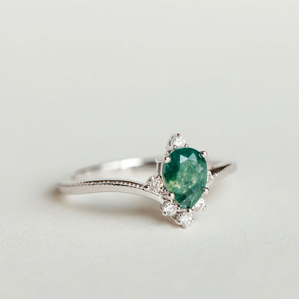 Ring with 7X5MM Pear Shape Moss Agate and .12 Carat TW of Diamonds in 10kt White Gold