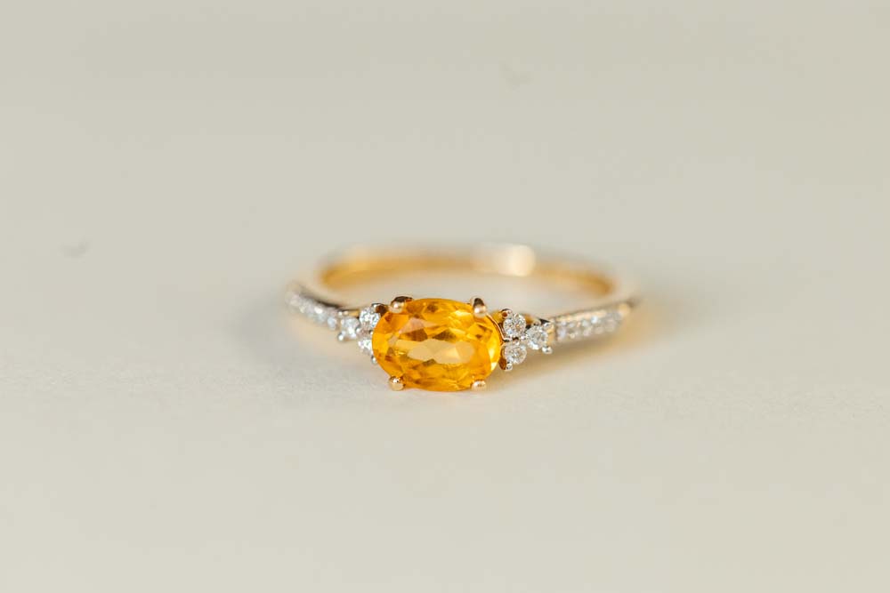 Ring with Oval 7X5MM Citrine and .10 Carat TW of Diamonds 14kt Yellow Gold