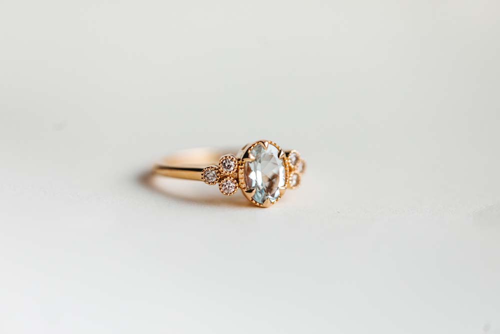 Ring with 8X6MM Oval Aquamarine and .15 Carat TW of Diamonds 14kt Yellow Gold