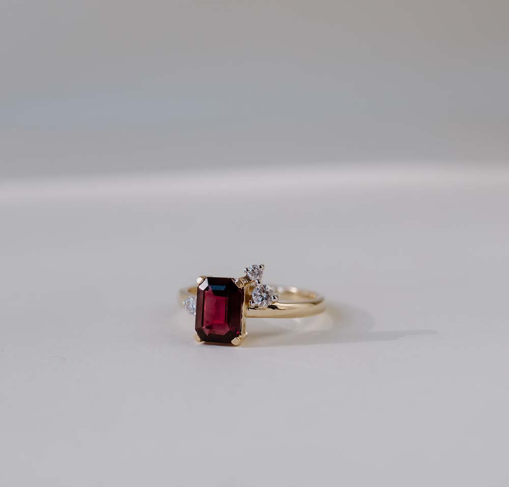 Ring with 8X6MM Emerald Cut Rhodolite Garnet and .15 Carat TW of Diamonds 14kt Yellow Gold