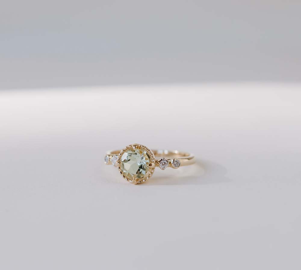 Ring with 6MM Round Green Amethyst and .05 Carat TW of Diamonds in 14kt Yellow Gold