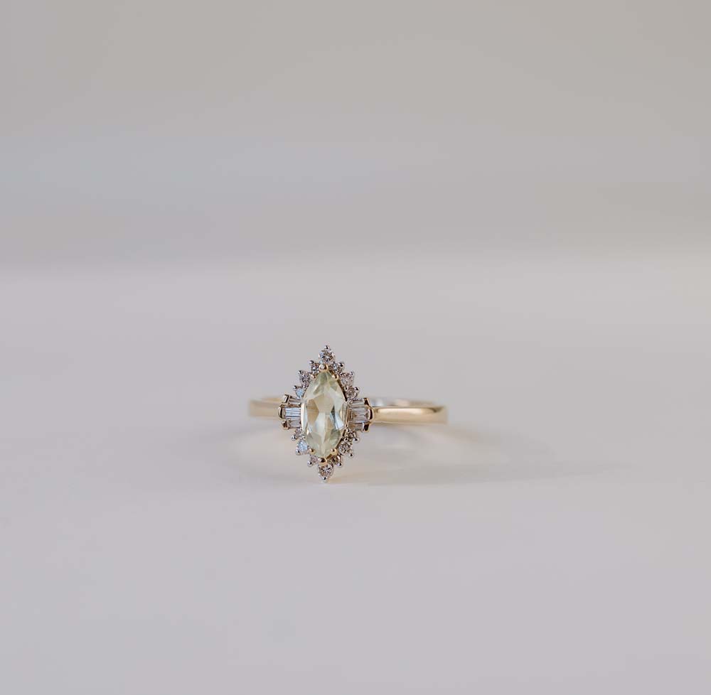 Ring with 8X4MM Marquise Cut Green Amethyst and .15 Carat TW of Diamonds 14kt Yellow Gold