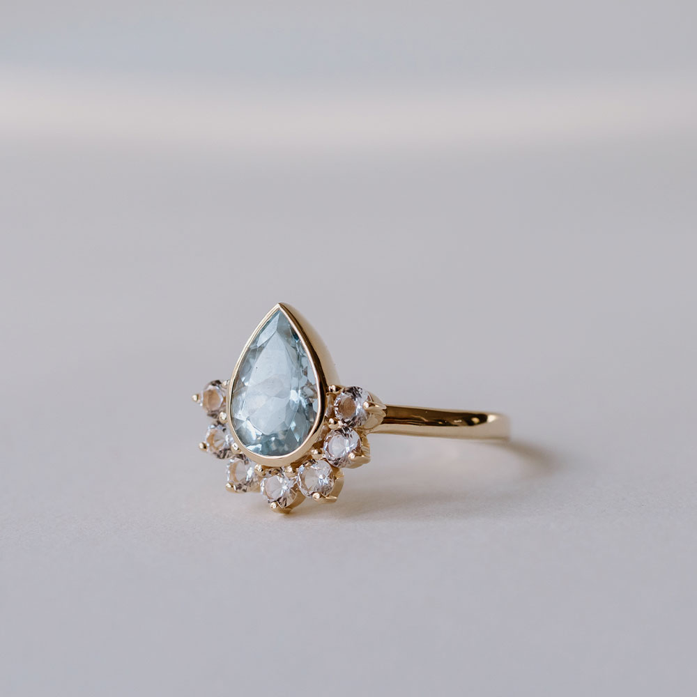 Ring with Pear Shape Aquamarine and Round White Topaz 14kt Yellow Gold