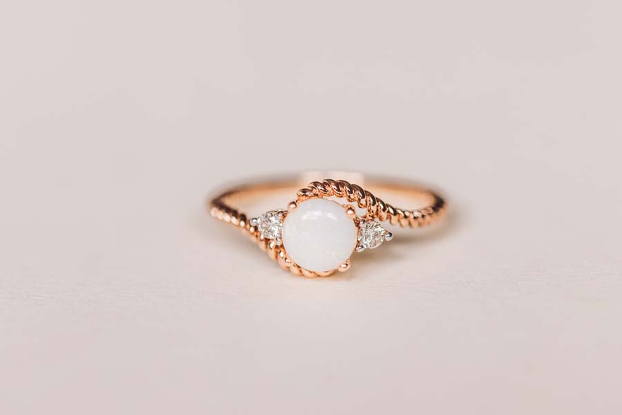 Halo Ring with .08 Carat TW of Diamonds and 5MM Opal in 10kt Rose Gold