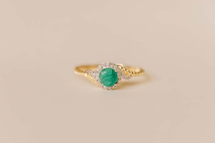 Halo Ring with .10 Carat TW of Diamonds and 5MM Emerald in 10kt Yellow Gold