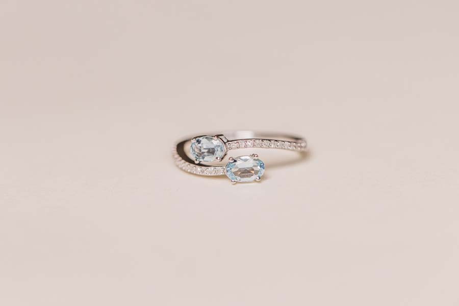 Bypass Ring with .17 Carat TW of Diamonds and 6x4MM Aquamarine 10kt White Gold