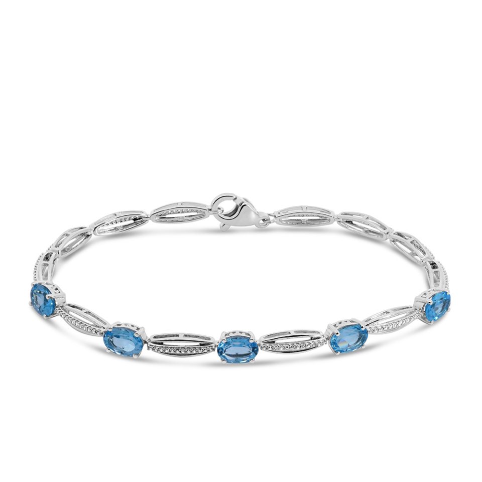 Tennis Bracelet with 7x5MM Blue Topaz and Cubic Zirconia