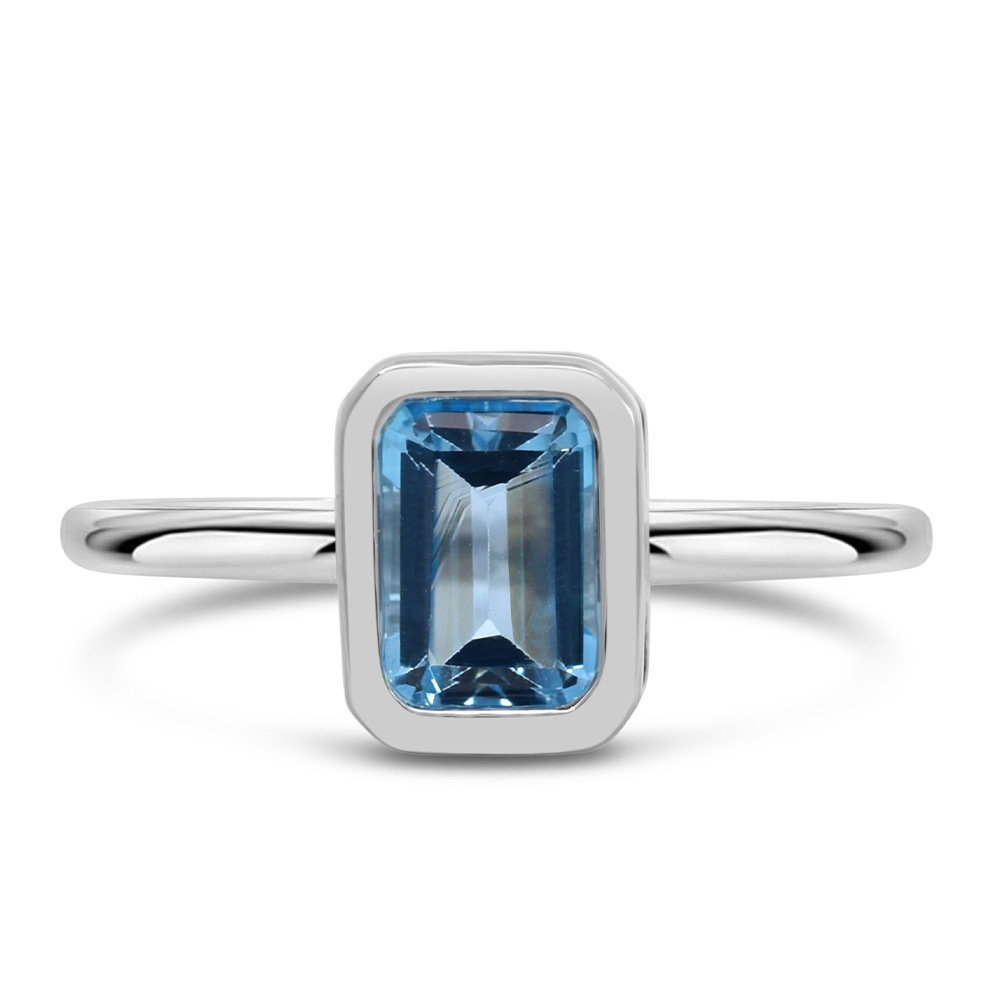 Ring with 7x5MM Emerald Cut Blue Topaz 10kt White Gold