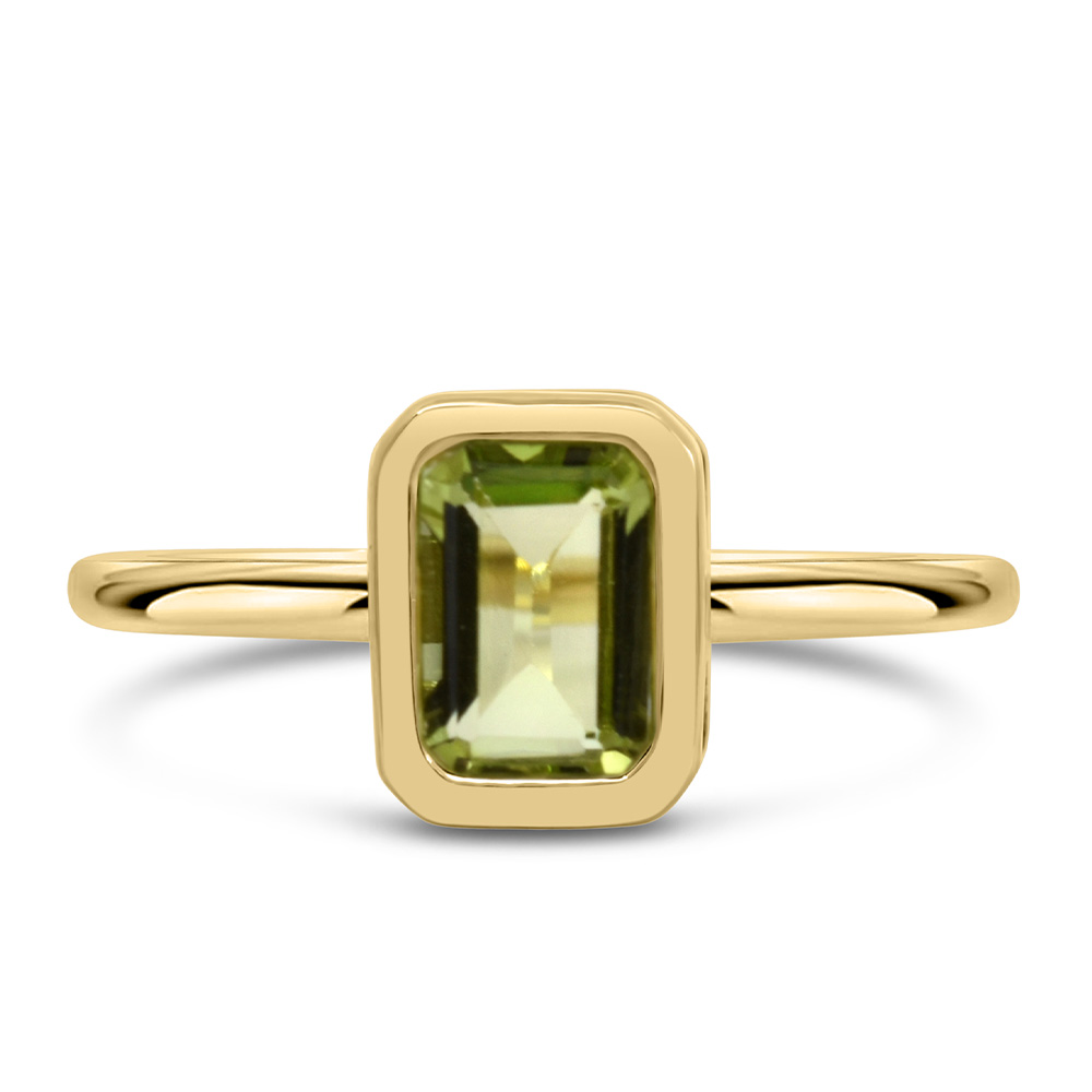 Ring with 7x5MM Emerald Cut Peridot in 10kt Yellow Gold